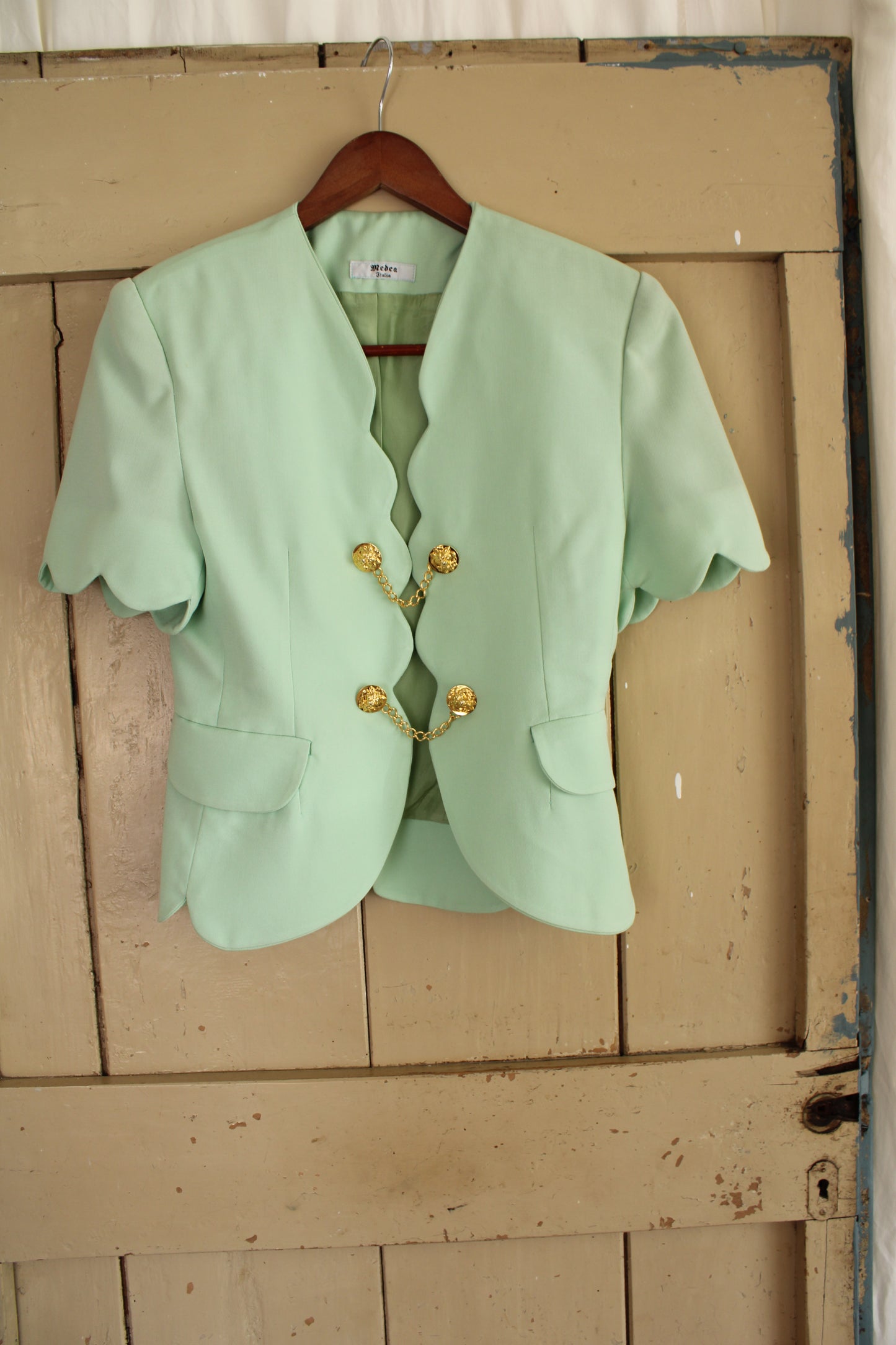 Blusa anni 80 menta con alamari