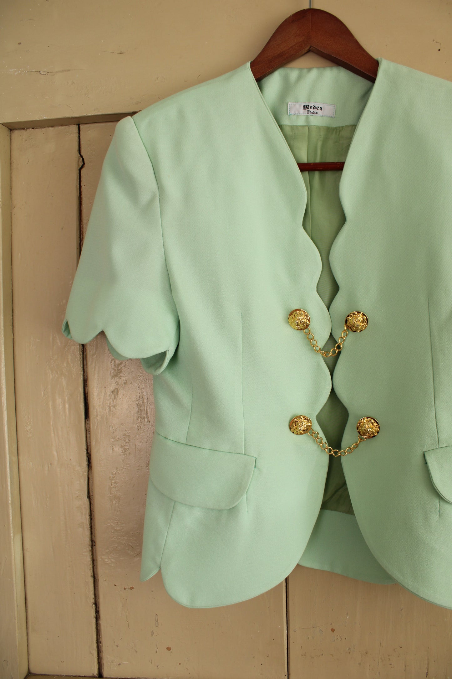 Blusa anni 80 menta con alamari